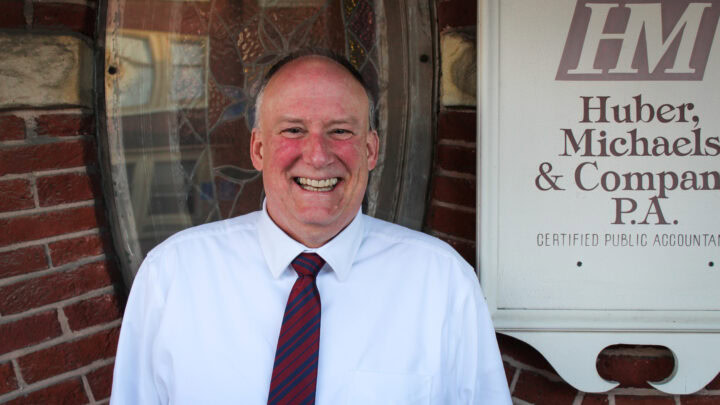 Professional accountant Huber Michaels outside his firm in Pennsylvania.